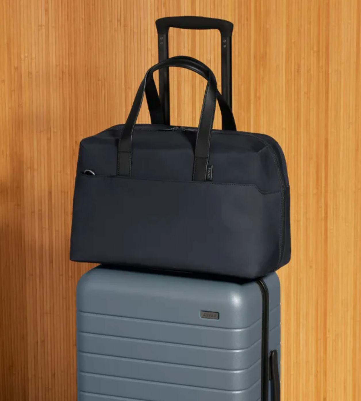 travel-bags-with-trolley-sleeve